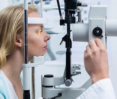 Eye exam at a slit lamp