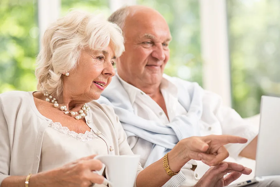 Two older adults enjoying life after cataract surgery